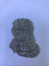 Lady wearing hat and holding dog cutting die for paper crafting and scrapbooking