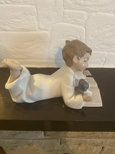 Nao lladro porcelain - by,