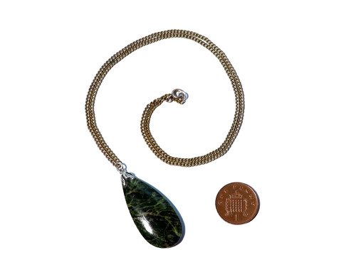 Pear shaped green gemstone - shaped,