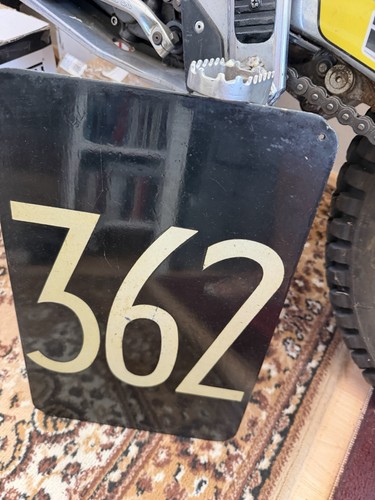 Old enamel sign bus - old,
