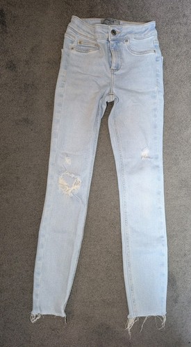 Girls age light blue ripped - 11,