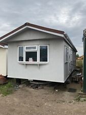 Rough Cast Mobile Home