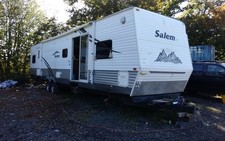 AMERICAN CARAVAN, 2 SLIDE OUTS, 2 BEDROOM 40FT LONG, NEEDS A NEW ROOF, REFURBISH