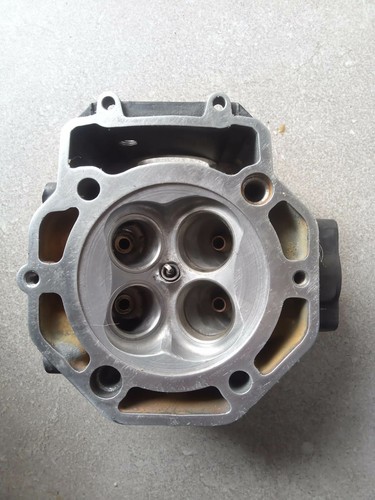 Cylinder head without - , valves