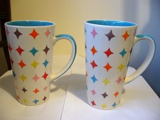 WHITTARD 2 X TALL HAND PAINTED WHITE MULTI-COLOURED STARS LATTE MUGS GOOD USED X