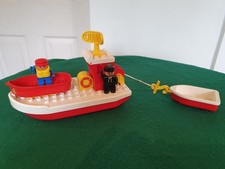 Vintage Lego  Duplo Boat With Accessories Figures And Smaller Boat In Tow.
