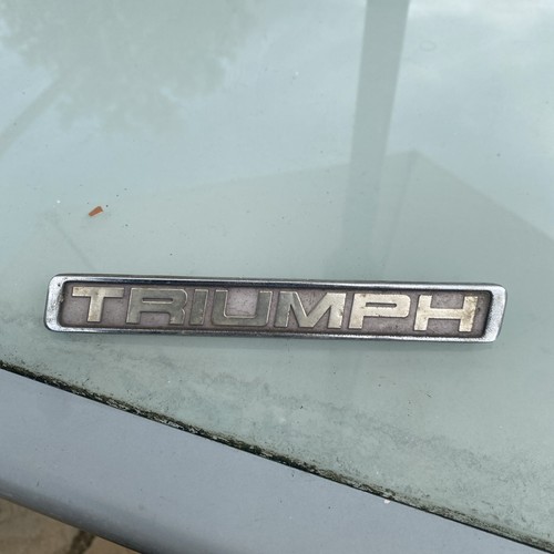 Triumph badge - triumph,