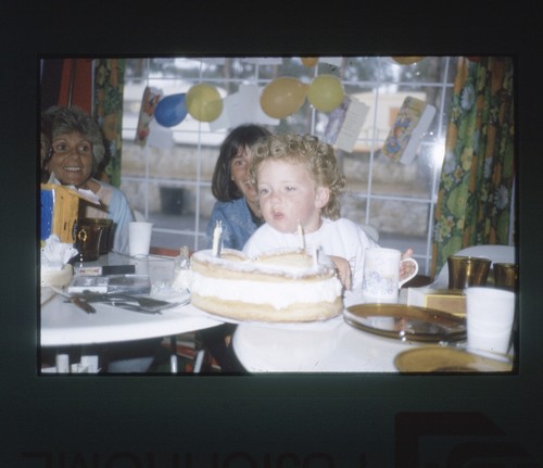 35mm slide child blowing - child, out