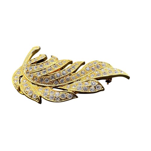 Gold tone rhinestone leaf - tone,