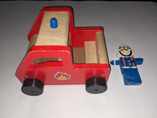 vintage wooden fire truck with fireman