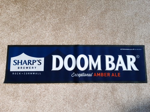 Rubber backed drip - bar, runner