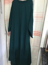 Large bottle green maxi dress with batwing sleeves and built in cape at the back
