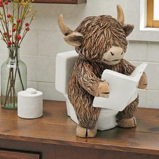Happy Highland Cow on Toilet