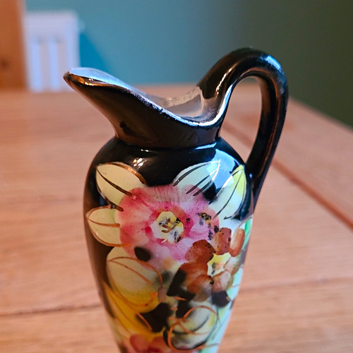 Unmarked small black ceramic - unmarked,