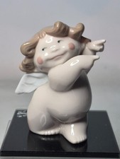 NAO by Lladro HE DID IT Cheeky