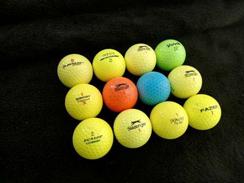 Coloured golf balls in - golf,