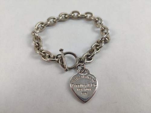 Please return tiffany - &, co