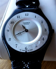 SWATCH  2009 SKIN WATCH  'REFLECTING STARS  ' SFB 140  NEW BATTERY KEEPING TIME