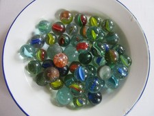 A Collection Of 50 Vintage Twist/Swirl Glass Marbles.