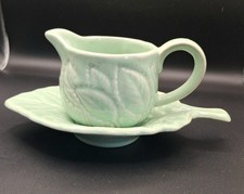 This is a Carlton Ware "Foxglove" creamer and saucer set.