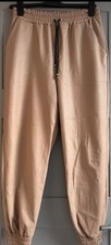 Beige PVC Trousers In