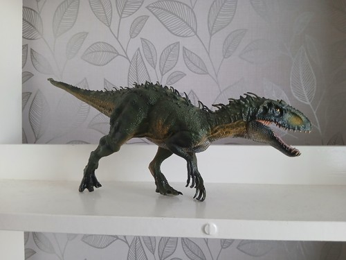 Large plastic dinosaur with - plastic,