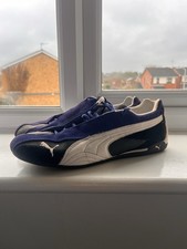 Navy blue and black Puma speed