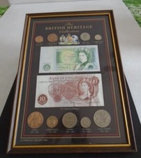 VINTAGE FRAMED THE BRITISH HERITAGE COIN AND NOTE COLLECTION - 9 COINS + 2 NOTES