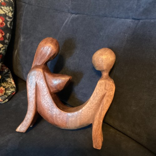 Wooden carving man and - wooden,