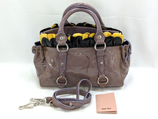 MIU MIU Patent Leather Ruffle