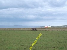 Photo 6x4 Grazing land beside