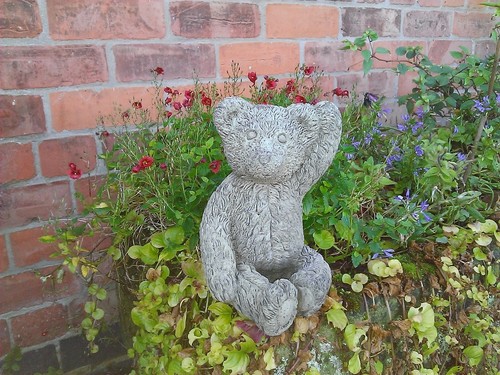 Stone garden sitting waving - garden,