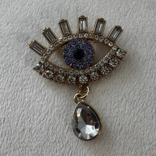 Gold tone evil - tone, pin