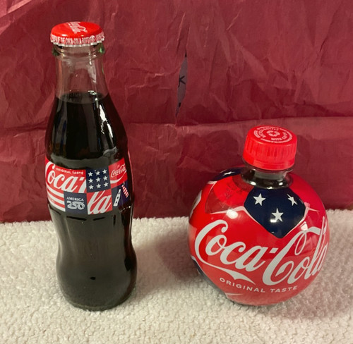 Two 2026 coca cola - two, bottles