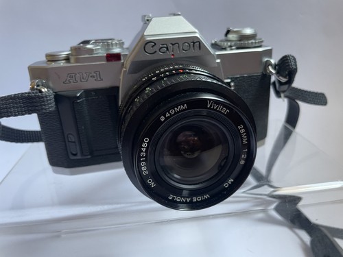 Canon 35mm slr camera - av-1,