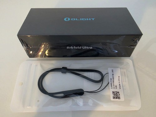New sealed olight arkfeld - &,