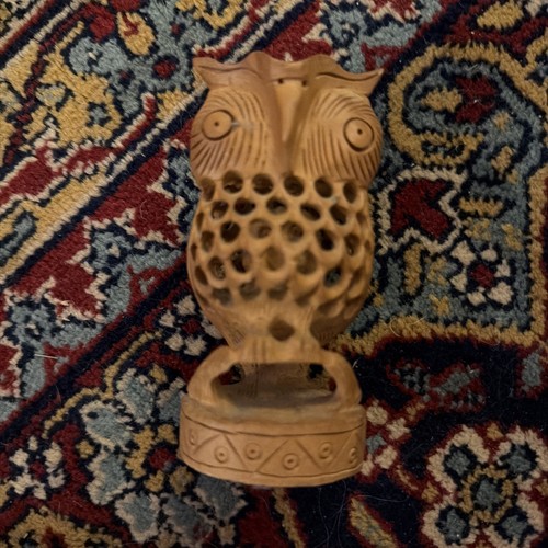 Hand carved wooden owl - hand,