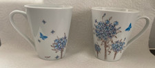 2 x Waterside Mugs. Butterfly & Flowers. Fine China. White & Blue. 10cm x 9cm.