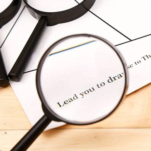 Hand held magnifying glass - ,