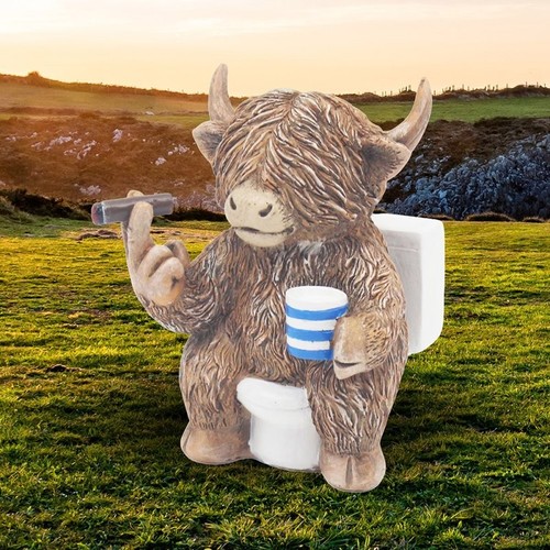 Rustic sitting highland cow - sitting,