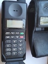 Vintage 1990s Old Retro mobile Phone Shop 0range Motorola flip with battery case