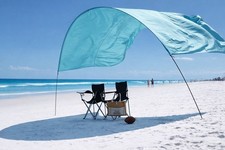 Wind powered beach canopy sun - powered,