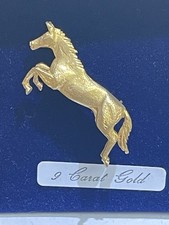 Solid 9 ct gold rearing  horse brooch.uk hallmarked 
