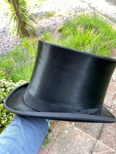 Late Victorian black silk top hat recently refurbished by Herbert Johnson 58.5cm