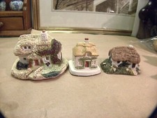 miniature thatched cottages