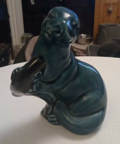 Poole pottery otter with - otter, fish