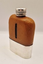 A Vintage White Metal, Leather