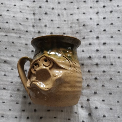 Pretty ugly pottery mug - pretty,