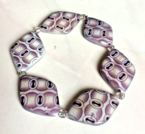 Purple white coloured - &,
