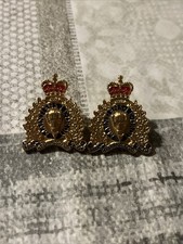 Pair Of Obsolete Royal Canadian Mounted Police Pin Badges